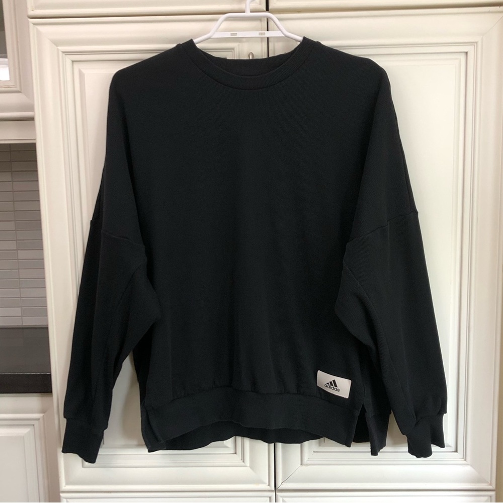 adidas woman’s relaxed fit sweatshirt